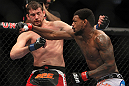 CHICAGO, IL - JANUARY 28:  (R-L) Michael Johnson and Shane Roller trade punches during the UFC on FOX event at United Center on January 28, 2012 in Chicago, Illinois.  (Photo by Josh Hedges/Zuffa LLC/Zuffa LLC via Getty Images) *** Local Caption *** Michael Johnson; Shane Roller