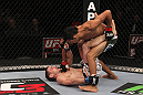 CHICAGO, IL - JANUARY 28:  (R-L) Charles Oliveira punches Eric Wisely during the UFC on FOX event at United Center on January 28, 2012 in Chicago, Illinois.  (Photo by Nick Laham/Zuffa LLC/Zuffa LLC via Getty Images) *** Local Caption *** Eric Wisely; Charles Oliveira