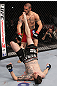 CHICAGO, IL - JANUARY 28:  George Roop kicks up at Cub Swanson from the bottom during the UFC on FOX event at United Center on January 28, 2012 in Chicago, Illinois.  (Photo by Nick Laham/Zuffa LLC/Zuffa LLC via Getty Images) *** Local Caption *** Cub Swanson; George Roop