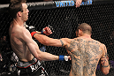 CHICAGO, IL - JANUARY 28:  (L-R) George Roop and Cub Swanson trade punches during the UFC on FOX event at United Center on January 28, 2012 in Chicago, Illinois.  (Photo by Nick Laham/Zuffa LLC/Zuffa LLC via Getty Images) *** Local Caption *** Cub Swanson; George Roop