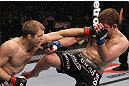 CHICAGO, IL - JANUARY 28:  (L-R) Evan Dunham punches Nik Lentz during the UFC on FOX event at United Center on January 28, 2012 in Chicago, Illinois.  (Photo by Nick Laham/Zuffa LLC/Zuffa LLC via Getty Images) *** Local Caption *** Nik Lentz; Evan Dunham