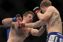 CHICAGO, IL - JANUARY 28:  (R-L) Evan Dunham punches Nik Lentz during the UFC on FOX event at United Center on January 28, 2012 in Chicago, Illinois.  (Photo by Josh Hedges/Zuffa LLC/Zuffa LLC via Getty Images) *** Local Caption *** Nik Lentz; Evan Dunham