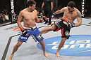 CHICAGO, IL - JANUARY 28:  (R-L) Chris Weidman kicks Demian Maia during the UFC on FOX event at United Center on January 28, 2012 in Chicago, Illinois.  (Photo by Nick Laham/Zuffa LLC/Zuffa LLC via Getty Images) *** Local Caption *** Chris Weidman; Demian Maia