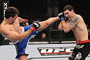 CHICAGO, IL - JANUARY 28:  (L-R) Demian Maia kicks Chris Weidman during the UFC on FOX event at United Center on January 28, 2012 in Chicago, Illinois.  (Photo by Nick Laham/Zuffa LLC/Zuffa LLC via Getty Images) *** Local Caption *** Chris Weidman; Demian Maia