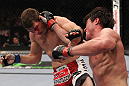CHICAGO, IL - JANUARY 28:  (R-L) Chael Sonnen punches Michael Bisping during the UFC on FOX event at United Center on January 28, 2012 in Chicago, Illinois.  (Photo by Nick Laham/Zuffa LLC/Zuffa LLC via Getty Images) *** Local Caption *** Chael Sonnen; Michael Bisping