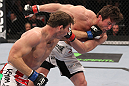 CHICAGO, IL - JANUARY 28:  (L-R) Michael Bisping punches Chael Sonnen during the UFC on FOX event at United Center on January 28, 2012 in Chicago, Illinois.  (Photo by Nick Laham/Zuffa LLC/Zuffa LLC via Getty Images) *** Local Caption *** Chael Sonnen; Michael Bisping