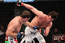 CHICAGO, IL - JANUARY 28:  (R-L) Chael Sonnen and Michael Bisping trade punches during the UFC on FOX event at United Center on January 28, 2012 in Chicago, Illinois.  (Photo by Nick Laham/Zuffa LLC/Zuffa LLC via Getty Images) *** Local Caption *** Chael Sonnen; Michael Bisping