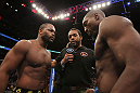 CHICAGO, IL - JANUARY 28:  (L-R) Light Heavyweight opponents Rashad Evans and Phil Davis receive final instructions from referee Herb Dean before their bout during the UFC on FOX event at United Center on January 28, 2012 in Chicago, Illinois.  (Photo by Josh Hedges/Zuffa LLC/Zuffa LLC via Getty Images) *** Local Caption *** Rashad Evans; Phil Davis; Herb Dean