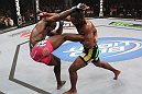 CHICAGO, IL - JANUARY 28:  (R-L) Rashad Evans punches Phil Davis during the UFC on FOX event at United Center on January 28, 2012 in Chicago, Illinois.  (Photo by Nick Laham/Zuffa LLC/Zuffa LLC via Getty Images) *** Local Caption *** Rashad Evans; Phil Davis