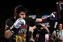 LAS VEGAS, NV - FEBRUARY 01:  Carlos Condit works out for the media and fans during the UFC 143 open workouts at Mandalay Bay Events Center on February 1, 2012 in Las Vegas, United States.  (Photo by Josh Hedges/Zuffa LLC/Zuffa LLC via Getty Images) *** Local Caption *** Carlos Condit