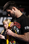 LAS VEGAS, NV - FEBRUARY 01:  Carlos Condit wraps his hands before working out for the media and fans during the UFC 143 open workouts at Mandalay Bay Events Center on February 1, 2012 in Las Vegas, United States.  (Photo by Josh Hedges/Zuffa LLC/Zuffa LLC via Getty Images) *** Local Caption *** Carlos Condit