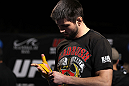 LAS VEGAS, NV - FEBRUARY 01:  Carlos Condit wraps his hands before working out for the media and fans during the UFC 143 open workouts at Mandalay Bay Events Center on February 1, 2012 in Las Vegas, United States.  (Photo by Josh Hedges/Zuffa LLC/Zuffa LLC via Getty Images) *** Local Caption *** Carlos Condit