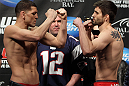 LAS VEGAS, NV - FEBRUARY 03:  (L-R) Welterweight opponents Nick Diaz and Carlos Condit face off after weighing in during the UFC 143 official weigh in at Mandalay Bay Events Center on February 3, 2012 in Las Vegas, Nevada.|2:55:8  (Photo by Josh Hedges/Zuffa LLC/Zuffa LLC via Getty Images) *** Local Caption *** Nick Diaz; Carlos Condit