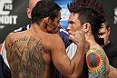 LAS VEGAS, NV - FEBRUARY 03:  (L-R) Bantamweight opponents Renan Barao and Scott Jorgensen face off after weighing in during the UFC 143 official weigh in at Mandalay Bay Events Center on February 3, 2012 in Las Vegas, Nevada.|2:55:8  (Photo by Josh Hedges/Zuffa LLC/Zuffa LLC via Getty Images) *** Local Caption *** Renan Barao; Scott Jorgensen