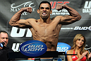 LAS VEGAS, NV - FEBRUARY 03:  Renan Barao weighs in during the UFC 143 official weigh in at Mandalay Bay Events Center on February 3, 2012 in Las Vegas, Nevada.|2:55:8  (Photo by Josh Hedges/Zuffa LLC/Zuffa LLC via Getty Images) *** Local Caption *** Renan Barao