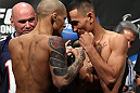 LAS VEGAS, NV - FEBRUARY 03:  (L-R) Featherweight opponents Dustin Poirier and Max Holloway face off after weighing in during the UFC 143 official weigh in at Mandalay Bay Events Center on February 3, 2012 in Las Vegas, Nevada.|2:55:8  (Photo by Josh Hedges/Zuffa LLC/Zuffa LLC via Getty Images) *** Local Caption *** Dustin Poirier; Max Holloway