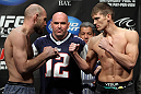 LAS VEGAS, NV - FEBRUARY 03:  (L-R) Opponents Dan Stittgen and Stephen Thompson face off after weighing in during the UFC 143 official weigh in at Mandalay Bay Events Center on February 3, 2012 in Las Vegas, Nevada.|2:55:8  (Photo by Josh Hedges/Zuffa LLC/Zuffa LLC via Getty Images) *** Local Caption *** Dan Stittgen; Stephen Thompson; Dana White