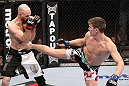 LAS VEGAS, NV - FEBRUARY 04:  Stephen Thompson (right) kicks Dan Stittgen during the UFC 143 event at Mandalay Bay Events Center on February 4, 2012 in Las Vegas, Nevada.  (Photo by Nick Laham/Zuffa LLC/Zuffa LLC via Getty Images) *** Local Caption *** Stephen Thompson; Dan Stittgen