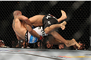 LAS VEGAS, NV - FEBRUARY 04:  Rafael Natal (black shorts) takes down Michael Kuiper during the UFC 143 event at Mandalay Bay Events Center on February 4, 2012 in Las Vegas, Nevada.  (Photo by Josh Hedges/Zuffa LLC/Zuffa LLC via Getty Images) *** Local Caption *** Rafael Natal; Michael Kuiper
