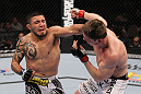 LAS VEGAS, NV - FEBRUARY 04:  (L-R) Henry Martinez punches Matt Riddle during the UFC 143 event at Mandalay Bay Events Center on February 4, 2012 in Las Vegas, Nevada.  (Photo by Nick Laham/Zuffa LLC/Zuffa LLC via Getty Images) *** Local Caption *** Henry Martinez; Matt Riddle