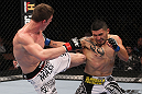 LAS VEGAS, NV - FEBRUARY 04:  Matt Riddle (left) kicks Henry Martinez during the UFC 143 event at Mandalay Bay Events Center on February 4, 2012 in Las Vegas, Nevada.  (Photo by Nick Laham/Zuffa LLC/Zuffa LLC via Getty Images) *** Local Caption *** Matt Riddle; Henry Martinez
