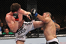 LAS VEGAS, NV - FEBRUARY 04:  (L-R) Matt Riddle kicks Henry Martinez during the UFC 143 event at Mandalay Bay Events Center on February 4, 2012 in Las Vegas, Nevada.  (Photo by Nick Laham/Zuffa LLC/Zuffa LLC via Getty Images) *** Local Caption *** Matt Riddle; Henry Martinez