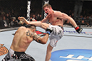 LAS VEGAS, NV - FEBRUARY 04:  (R-L) Matt Riddle kicks Henry Martinez during the UFC 143 event at Mandalay Bay Events Center on February 4, 2012 in Las Vegas, Nevada.  (Photo by Nick Laham/Zuffa LLC/Zuffa LLC via Getty Images) *** Local Caption *** Matt Riddle; Henry Martinez