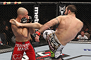LAS VEGAS, NV - FEBRUARY 04:  Matt Brown (right) kicks Chris Cope during the UFC 143 event at Mandalay Bay Events Center on February 4, 2012 in Las Vegas, Nevada.  (Photo by Nick Laham/Zuffa LLC/Zuffa LLC via Getty Images) *** Local Caption *** Matt Brown; Chris Cope