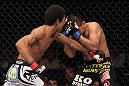 LAS VEGAS, NV - FEBRUARY 04:  Alex Caceres (left) punches Edwin Figueroa during the UFC 143 event at Mandalay Bay Events Center on February 4, 2012 in Las Vegas, Nevada.  (Photo by Nick Laham/Zuffa LLC/Zuffa LLC via Getty Images) *** Local Caption *** Alex Caceres; Edwin Figueroa