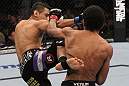 LAS VEGAS, NV - FEBRUARY 04:  Edwin Figueroa (left) kicks Alex Caceres during the UFC 143 event at Mandalay Bay Events Center on February 4, 2012 in Las Vegas, Nevada.  (Photo by Nick Laham/Zuffa LLC/Zuffa LLC via Getty Images) *** Local Caption *** Edwin Figueroa; Alex Caceres