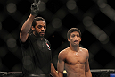 LAS VEGAS, NV - FEBRUARY 04:  Referee Herb Dean (left) deducts two points from Alex Caceres after a series of low blows in his fight against Edwin Figueroa during the UFC 143 event at Mandalay Bay Events Center on February 4, 2012 in Las Vegas, Nevada.  (Photo by Josh Hedges/Zuffa LLC/Zuffa LLC via Getty Images) *** Local Caption *** Herb Dean; Alex Caceres
