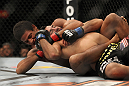 LAS VEGAS, NV - FEBRUARY 04:  Alex Caceres (left) attempts to submit Edwin Figueroa during the UFC 143 event at Mandalay Bay Events Center on February 4, 2012 in Las Vegas, Nevada.  (Photo by Josh Hedges/Zuffa LLC/Zuffa LLC via Getty Images) *** Local Caption *** Alex Caceres; Edwin Figueroa