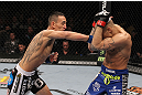 LAS VEGAS, NV - FEBRUARY 04:  Max Holloway (left) punches Dustin Poirier during the UFC 143 event at Mandalay Bay Events Center on February 4, 2012 in Las Vegas, Nevada.  (Photo by Nick Laham/Zuffa LLC/Zuffa LLC via Getty Images) *** Local Caption *** Max Holloway; Dustin Poirier