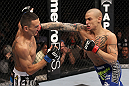 LAS VEGAS, NV - FEBRUARY 04:  Dustin Poirier (right) punches Max Holloway during the UFC 143 event at Mandalay Bay Events Center on February 4, 2012 in Las Vegas, Nevada.  (Photo by Nick Laham/Zuffa LLC/Zuffa LLC via Getty Images) *** Local Caption *** Dustin Poirier; Max Holloway