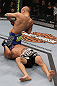 LAS VEGAS, NV - FEBRUARY 04:  Dustin Poirier (blue shorts) attempts to submit Max Holloway during the UFC 143 event at Mandalay Bay Events Center on February 4, 2012 in Las Vegas, Nevada.  (Photo by Nick Laham/Zuffa LLC/Zuffa LLC via Getty Images) *** Local Caption *** Dustin Poirier
