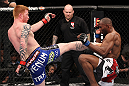 LAS VEGAS, NV - FEBRUARY 04:  Ed Herman (left) kicks Clifford Starks during the UFC 143 event at Mandalay Bay Events Center on February 4, 2012 in Las Vegas, Nevada.  (Photo by Nick Laham/Zuffa LLC/Zuffa LLC via Getty Images) *** Local Caption *** Ed Herman; Clifford Starks