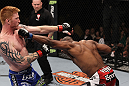 LAS VEGAS, NV - FEBRUARY 04:  Clifford Starks (right) punches Ed Herman during the UFC 143 event at Mandalay Bay Events Center on February 4, 2012 in Las Vegas, Nevada.  (Photo by Nick Laham/Zuffa LLC/Zuffa LLC via Getty Images) *** Local Caption *** Clifford Starks; Ed Herman