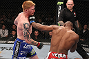 LAS VEGAS, NV - FEBRUARY 04:  Clifford Starks (right) punches Ed Herman during the UFC 143 event at Mandalay Bay Events Center on February 4, 2012 in Las Vegas, Nevada.  (Photo by Nick Laham/Zuffa LLC/Zuffa LLC via Getty Images) *** Local Caption *** Clifford Starks; Ed Herman