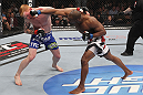 LAS VEGAS, NV - FEBRUARY 04:  (R-L) Clifford Starks punches Ed Herman during the UFC 143 event at Mandalay Bay Events Center on February 4, 2012 in Las Vegas, Nevada.  (Photo by Nick Laham/Zuffa LLC/Zuffa LLC via Getty Images) *** Local Caption *** Clifford Starks; Ed Herman