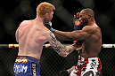 LAS VEGAS, NV - FEBRUARY 04:  Ed Herman (left) punches Clifford Starks during the UFC 143 event at Mandalay Bay Events Center on February 4, 2012 in Las Vegas, Nevada.  (Photo by Josh Hedges/Zuffa LLC/Zuffa LLC via Getty Images) *** Local Caption *** Ed Herman; Clifford Starks