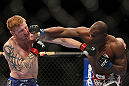 LAS VEGAS, NV - FEBRUARY 04:  (L-R) Ed Herman and Clifford Starks exchange punches during the UFC 143 event at Mandalay Bay Events Center on February 4, 2012 in Las Vegas, Nevada.  (Photo by Josh Hedges/Zuffa LLC/Zuffa LLC via Getty Images) *** Local Caption *** Ed Herman; Clifford Starks