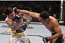 LAS VEGAS, NV - FEBRUARY 04:  Renan Barao (right) punches Scott Jorgensen during the UFC 143 event at Mandalay Bay Events Center on February 4, 2012 in Las Vegas, Nevada.  (Photo by Nick Laham/Zuffa LLC/Zuffa LLC via Getty Images) *** Local Caption *** Renan Barao; Scott Jorgensen