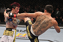 LAS VEGAS, NV - FEBRUARY 04:  Renan Barao (right) kicks Scott Jorgensen during the UFC 143 event at Mandalay Bay Events Center on February 4, 2012 in Las Vegas, Nevada.  (Photo by Nick Laham/Zuffa LLC/Zuffa LLC via Getty Images) *** Local Caption *** Renan Barao; Scott Jorgensen