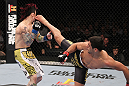 LAS VEGAS, NV - FEBRUARY 04:  Renan Barao (right) kicks Scott Jorgensen during the UFC 143 event at Mandalay Bay Events Center on February 4, 2012 in Las Vegas, Nevada.  (Photo by Nick Laham/Zuffa LLC/Zuffa LLC via Getty Images) *** Local Caption *** Renan Barao; Scott Jorgensen