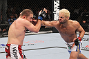LAS VEGAS, NV - FEBRUARY 04:  Josh Koscheck (right) punches Mike Pierce during the UFC 143 event at Mandalay Bay Events Center on February 4, 2012 in Las Vegas, Nevada.  (Photo by Nick Laham/Zuffa LLC/Zuffa LLC via Getty Images) *** Local Caption *** Josh Koscheck; Mike Pierce