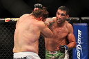 LAS VEGAS, NV - FEBRUARY 04:  Fabricio Werdum (right) punches Roy Nelson during the UFC 143 event at Mandalay Bay Events Center on February 4, 2012 in Las Vegas, Nevada.  (Photo by Josh Hedges/Zuffa LLC/Zuffa LLC via Getty Images) *** Local Caption *** Fabricio Werdum; Roy Nelson