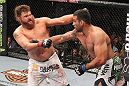 LAS VEGAS, NV - FEBRUARY 04:  (L-R) Roy Nelson and Fabricio Werdum exchange punches during the UFC 143 event at Mandalay Bay Events Center on February 4, 2012 in Las Vegas, Nevada.  (Photo by Nick Laham/Zuffa LLC/Zuffa LLC via Getty Images) *** Local Caption *** Fabricio Werdum; Roy Nelson