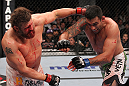 LAS VEGAS, NV - FEBRUARY 04:  (L-R) Roy Nelson punches Fabricio Werdum during the UFC 143 event at Mandalay Bay Events Center on February 4, 2012 in Las Vegas, Nevada.  (Photo by Nick Laham/Zuffa LLC/Zuffa LLC via Getty Images) *** Local Caption *** Roy Nelson; Fabricio Werdum