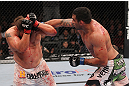 LAS VEGAS, NV - FEBRUARY 04:  (R-L) Fabricio Werdum punches Roy Nelson during the UFC 143 event at Mandalay Bay Events Center on February 4, 2012 in Las Vegas, Nevada.  (Photo by Nick Laham/Zuffa LLC/Zuffa LLC via Getty Images) *** Local Caption *** Fabricio Werdum; Roy Nelson