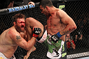 LAS VEGAS, NV - FEBRUARY 04:  Fabricio Werdum (right) knees Roy Nelson during the UFC 143 event at Mandalay Bay Events Center on February 4, 2012 in Las Vegas, Nevada.  (Photo by Nick Laham/Zuffa LLC/Zuffa LLC via Getty Images) *** Local Caption *** Fabricio Werdum; Roy Nelson